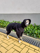 Load image into Gallery viewer, Whippet wearing a black wool onesie that covers her ears
