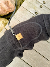 Load image into Gallery viewer, Whippet onesie photographed from above, showing the harness hole and a faux suede tag that reads Beans &amp; Sploot.
